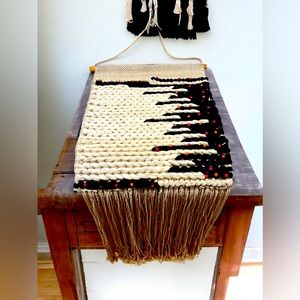 Vintage hanging Macrame for wall.

Approximately 42 inches by 16 inches across.